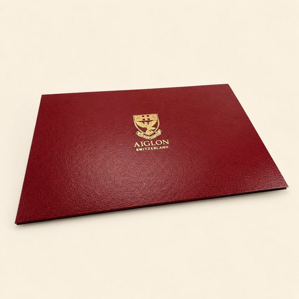 Porte-diplome bordeaux remborde a blason dore, grande ecole