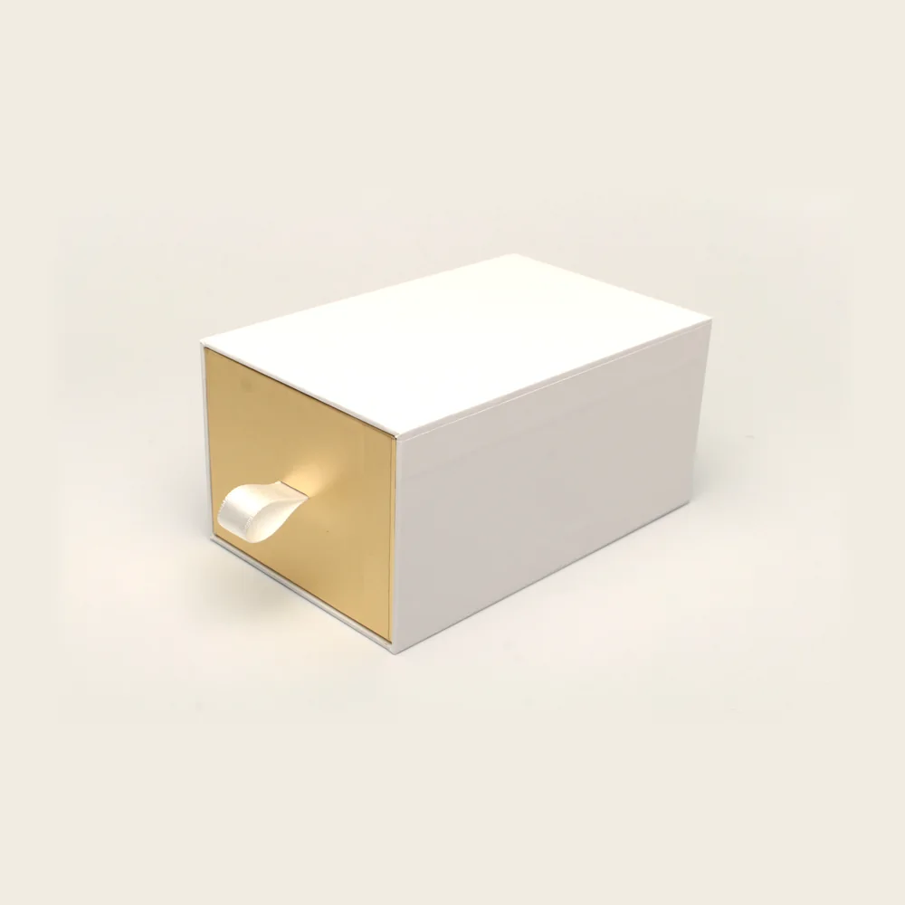 Boîte tiroir, façade dorée, pièce de la Haute Collection Luxe Packaging